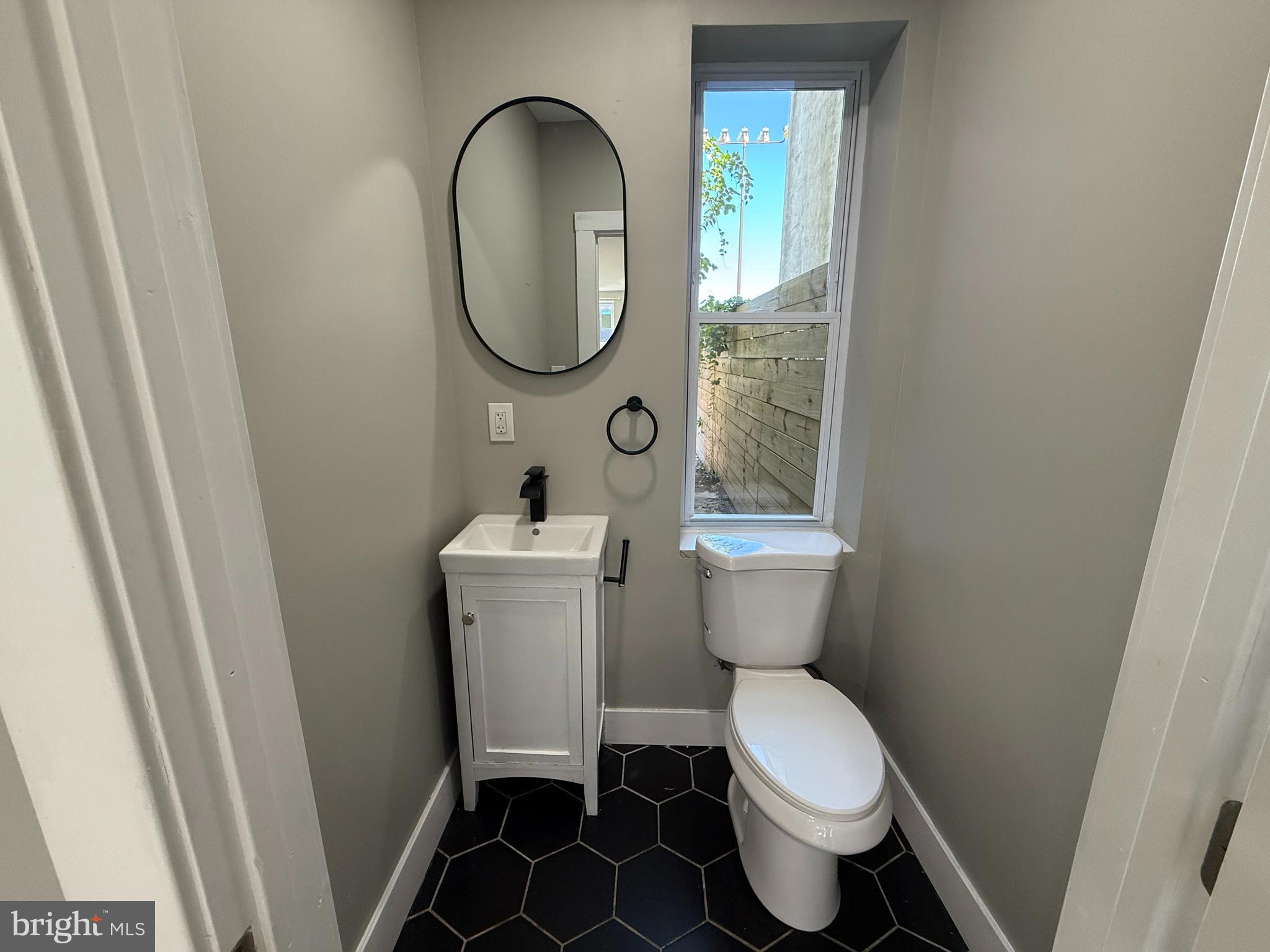 2943 Wharton Street Philadelphia, PA 19146 - Photo 9 of 36 a bathroom with a toilet and a sink