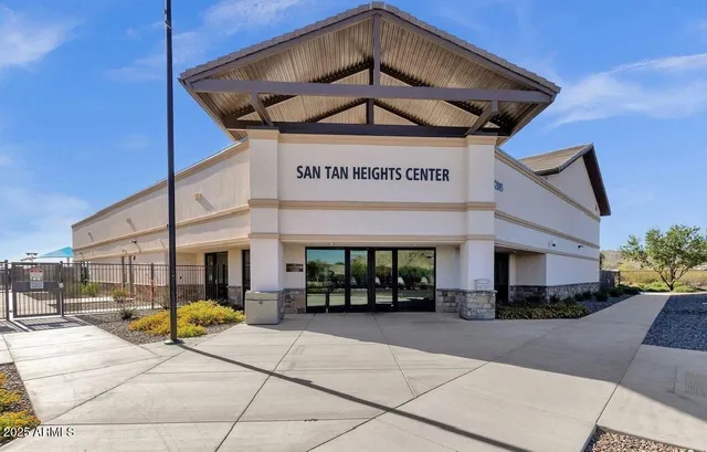 a view of outdoor space with garden and trees