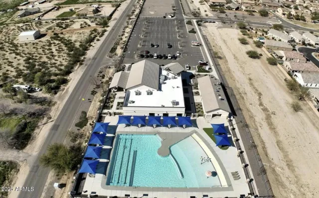 a view of a building with sitting area