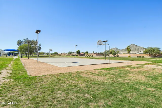 a view of a house with backyard porch and sitting area