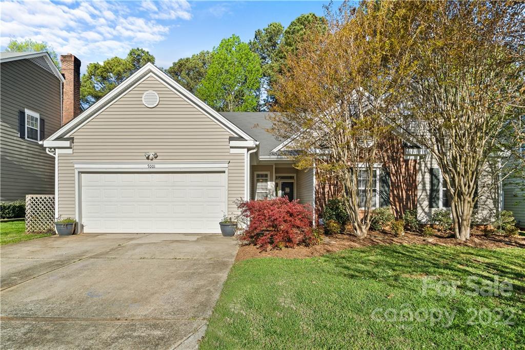 7001 Reedy Creek Road Charlotte, NC 28215 - Photo 1 of 24 a front view of house with yard and green space
