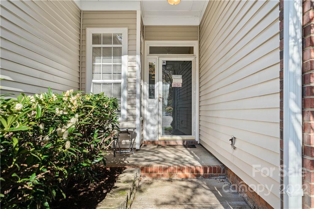 7001 Reedy Creek Road Charlotte, NC 28215 - Photo 2 of 24 a view of a door of the house