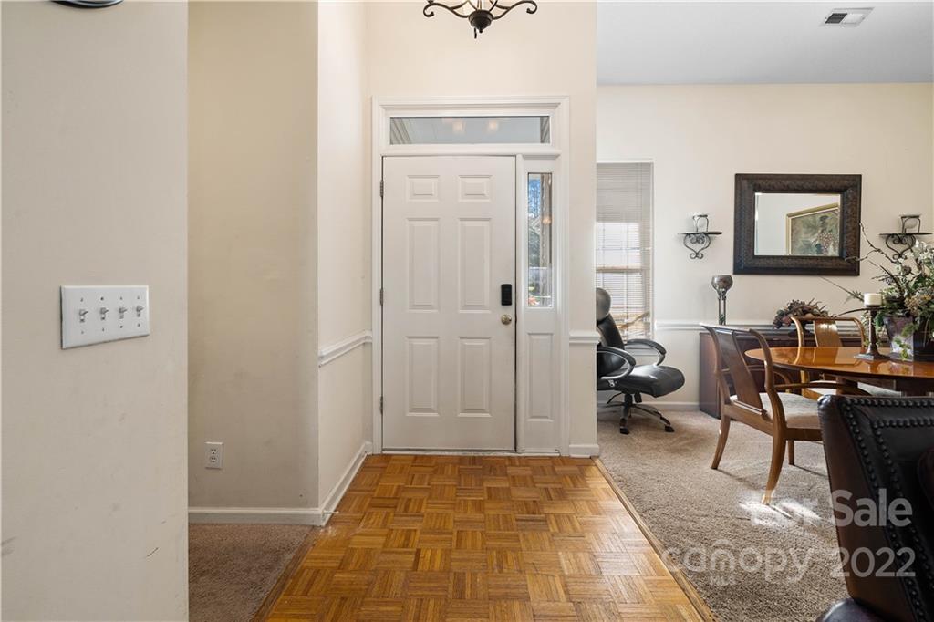 7001 Reedy Creek Road Charlotte, NC 28215 - Photo 3 of 24 a view of a workspace with a couch