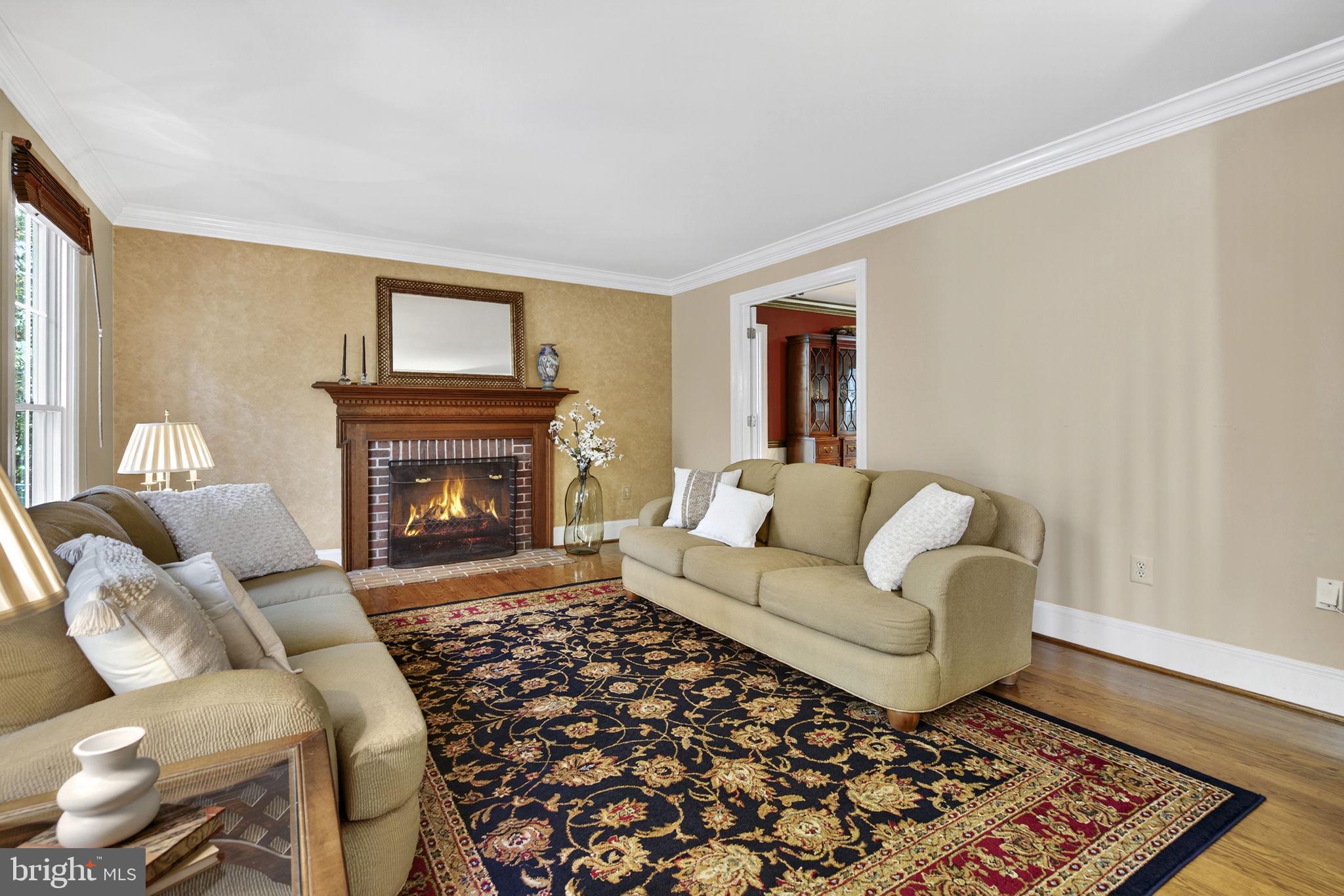 7255 Auburn Mill Road Warrenton, VA 20187 - Photo 14 of 58 a living room with furniture and a fireplace