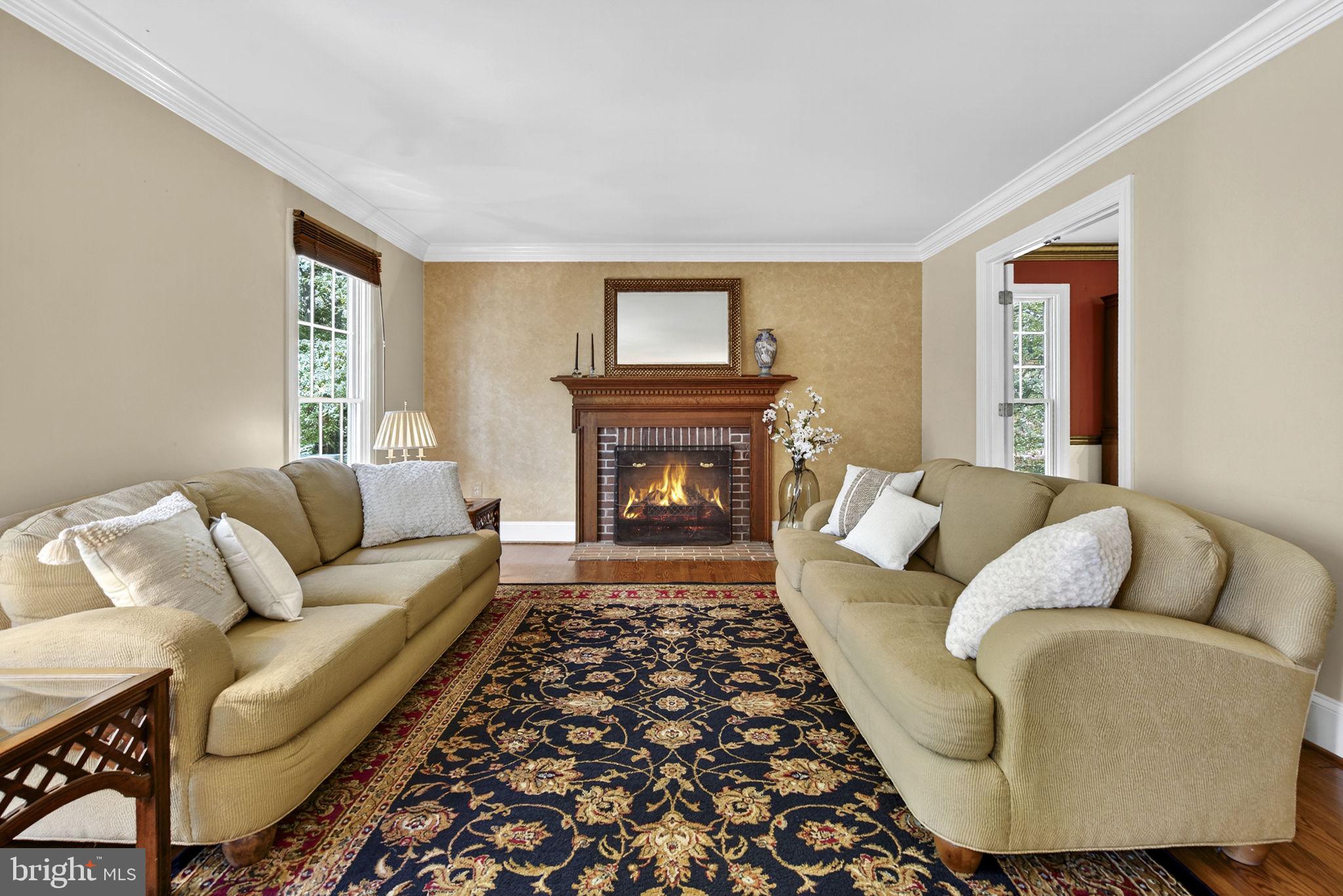 7255 Auburn Mill Road Warrenton, VA 20187 - Photo 15 of 58 a living room with furniture and a fireplace