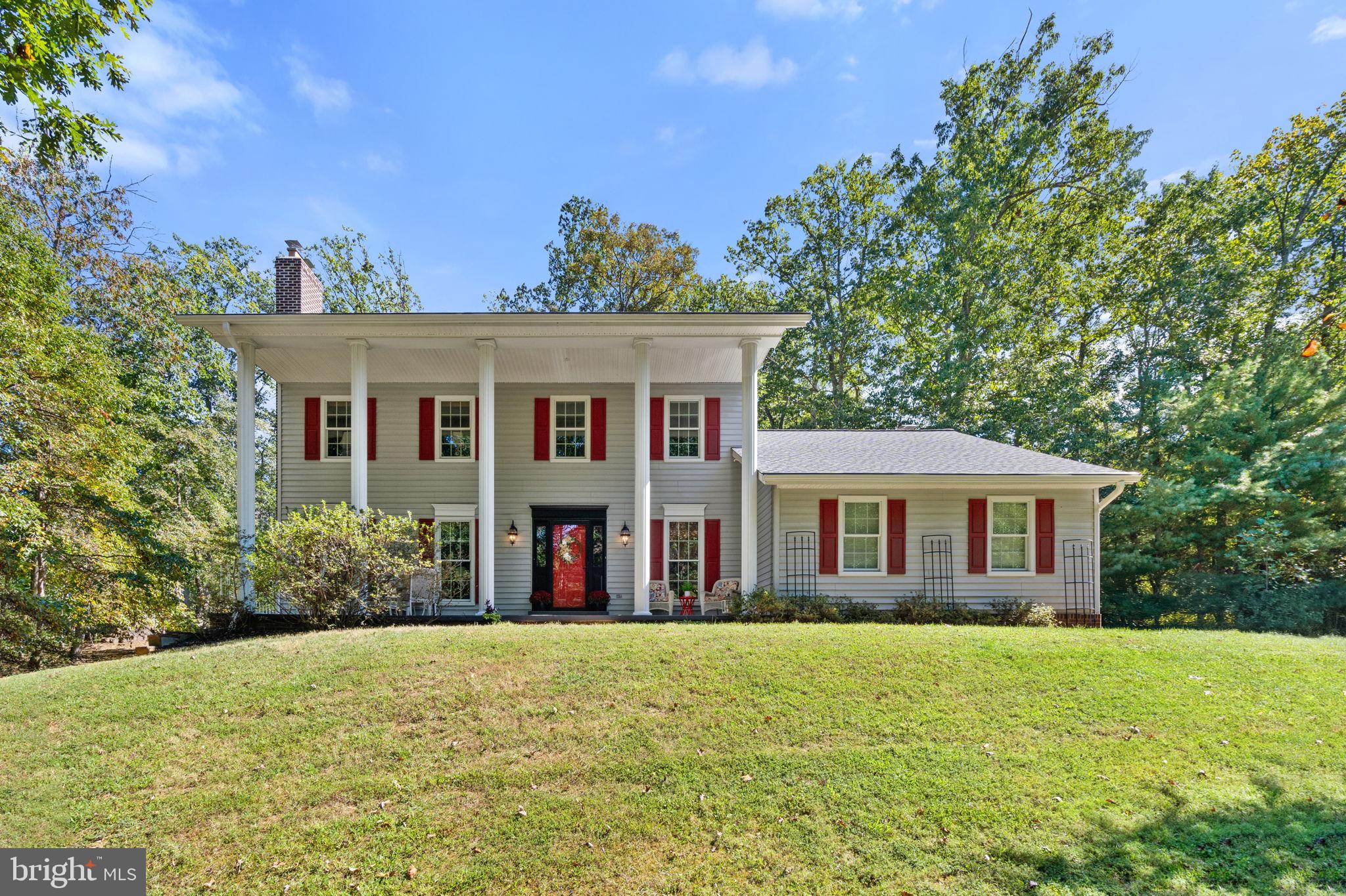 7255 Auburn Mill Road Warrenton, VA 20187 - Photo 2 of 58 front view of a house with a yard