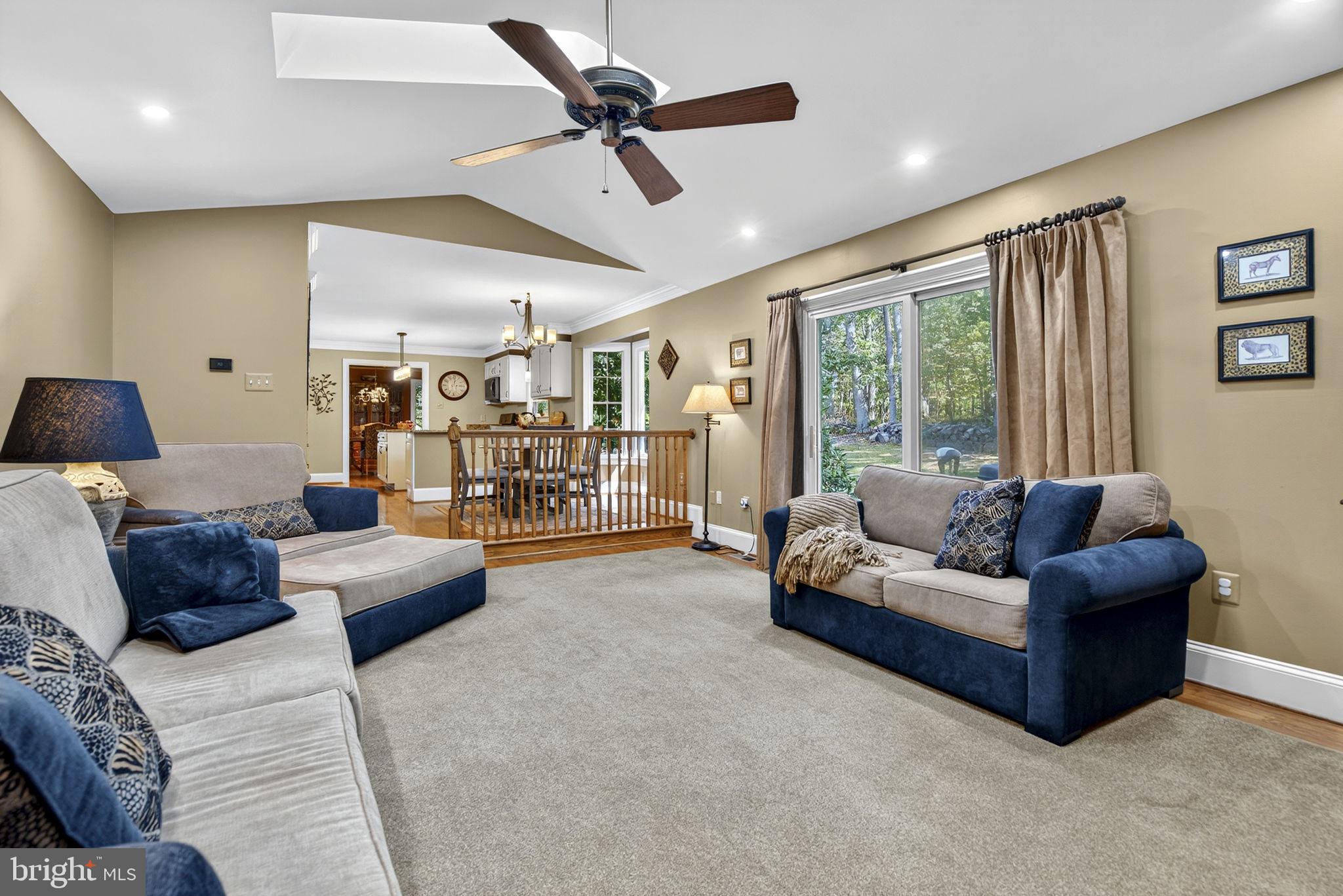 7255 Auburn Mill Road Warrenton, VA 20187 - Photo 29 of 58 a living room with furniture and a large window