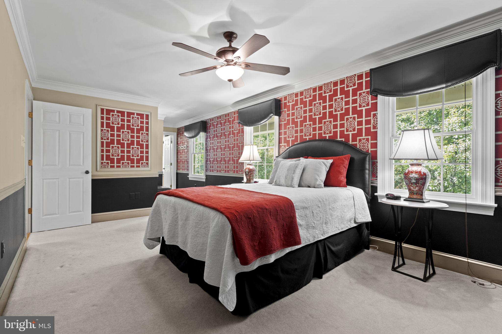 7255 Auburn Mill Road Warrenton, VA 20187 - Photo 34 of 58 a spacious bedroom with a large bed and a window