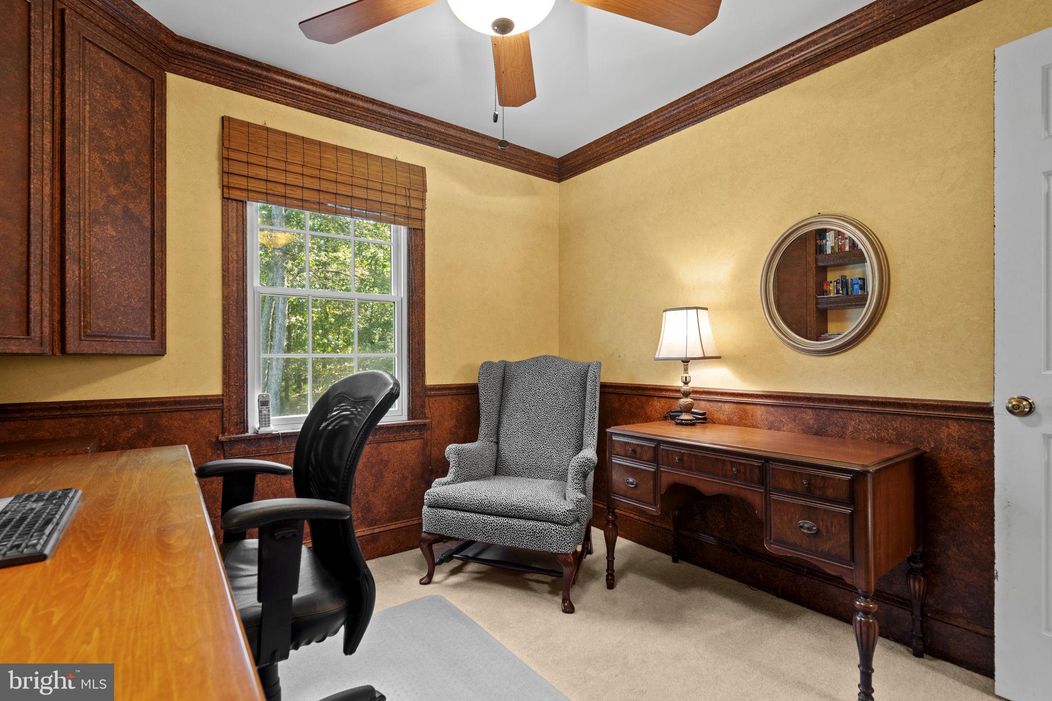 7255 Auburn Mill Road Warrenton, VA 20187 - Photo 42 of 58 a view of a livingroom with furniture and a window
