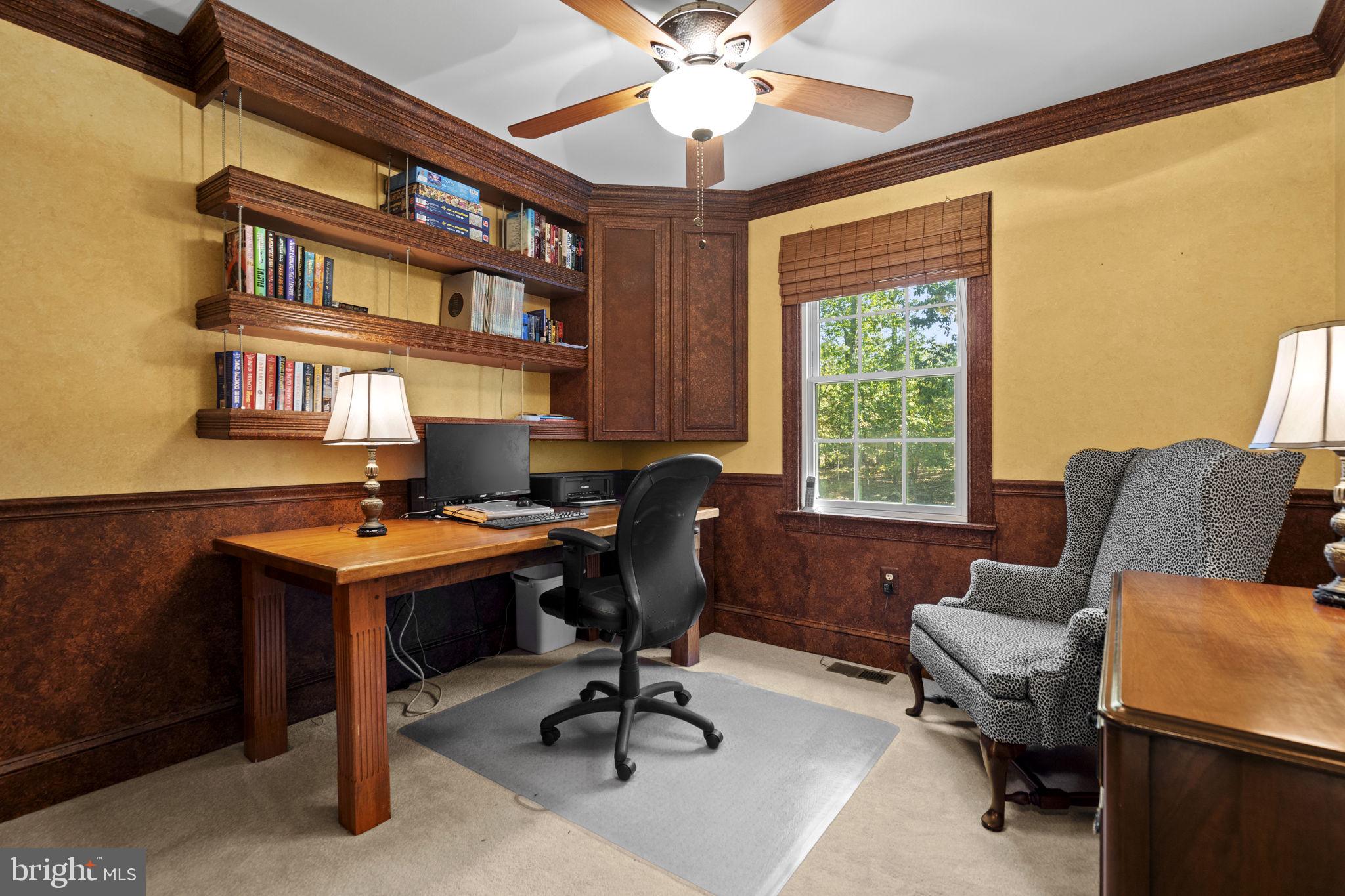 7255 Auburn Mill Road Warrenton, VA 20187 - Photo 43 of 58 a view of a workspace with furniture and a window