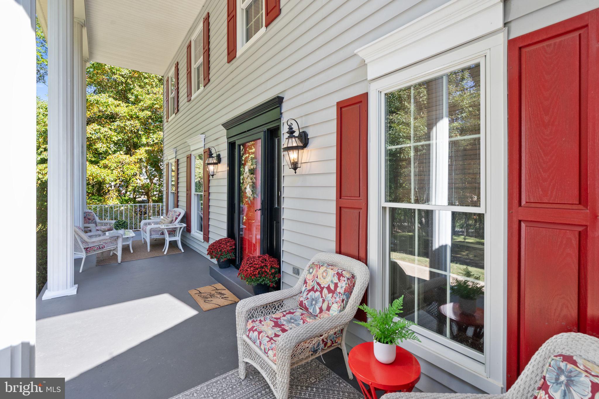 7255 Auburn Mill Road Warrenton, VA 20187 - Photo 10 of 58 a outdoor living space with furniture and a potted plant