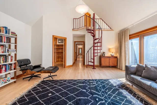 a bathroom with a granite countertop sink a large mirror and shower