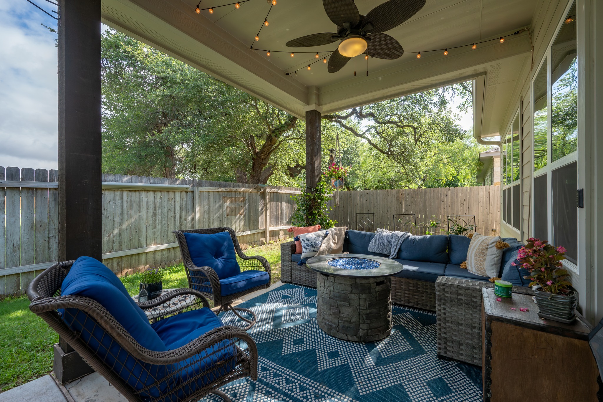 3925 Tavarez Street Round Rock, TX 78628 - Photo 23 of 27 Extended covered patio with a ceiling fan can be enjoyed in almost any weather