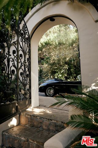 a view of swimming pool from a balcony