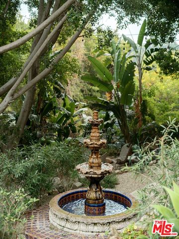 a picture of a room with a floor and white cabinet