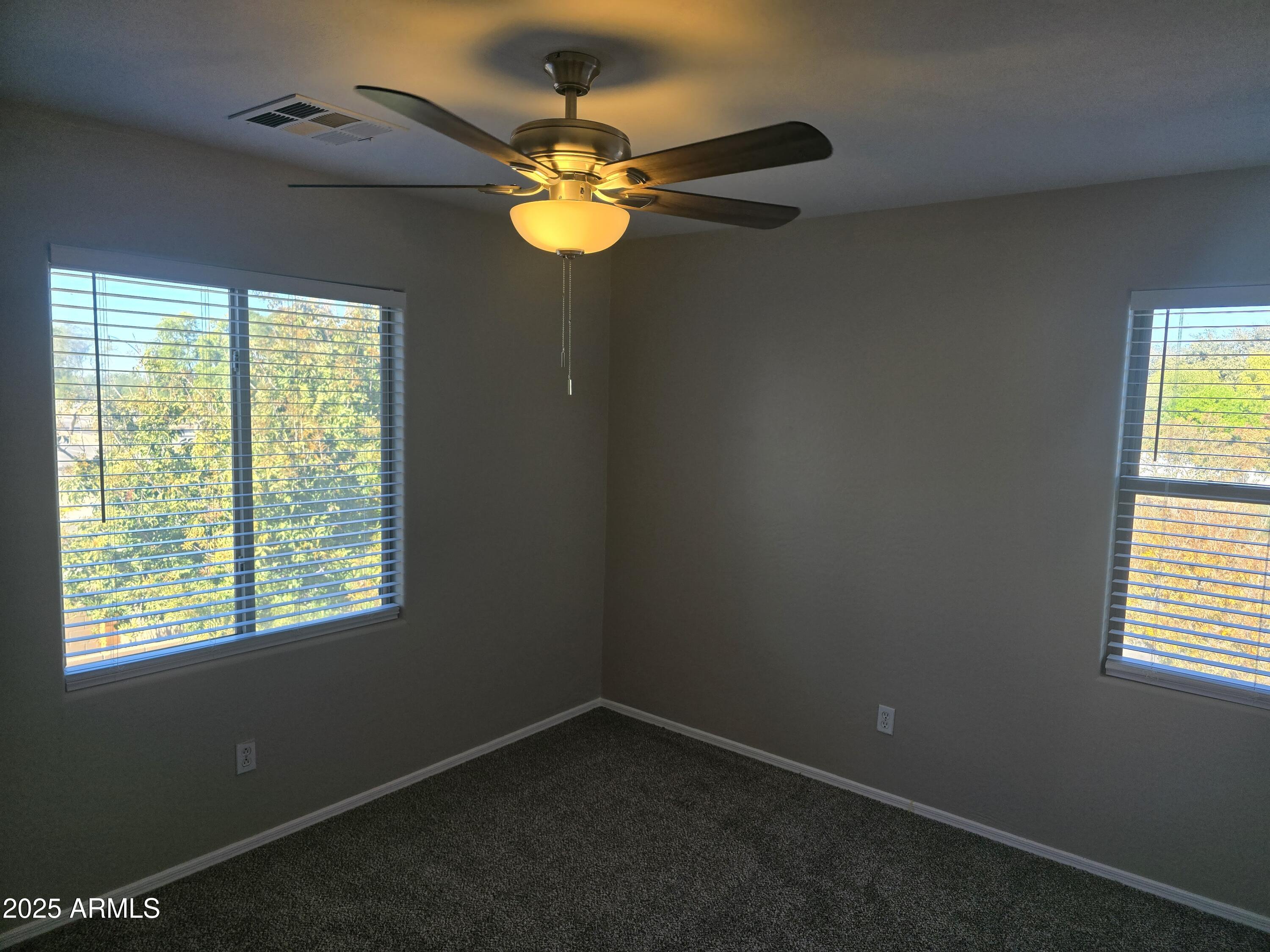 2644 East Megan Street Gilbert, AZ 85295 - Photo 14 of 21 a view of an empty room with a window