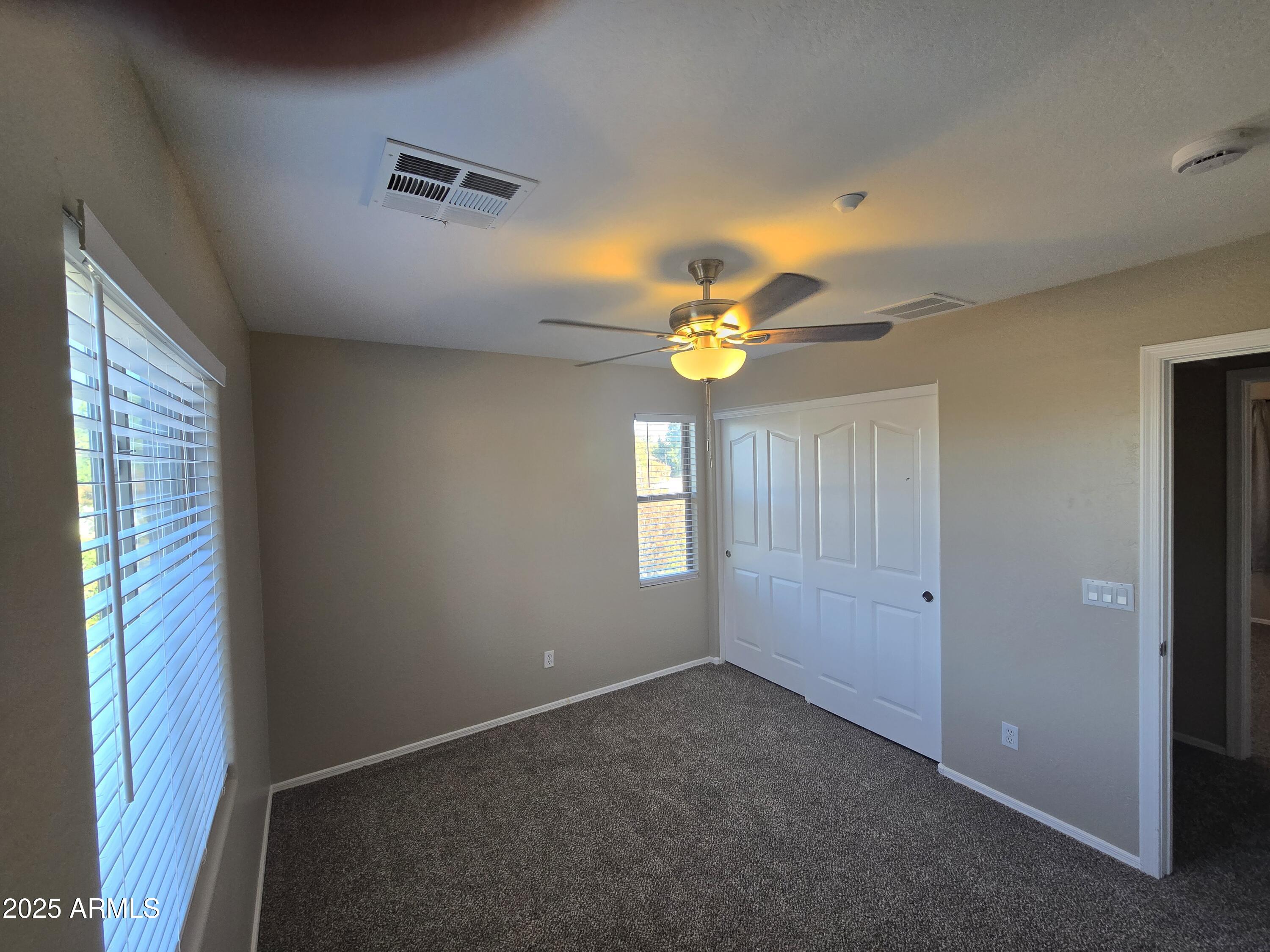 2644 East Megan Street Gilbert, AZ 85295 - Photo 15 of 21 a view of an empty room with a window