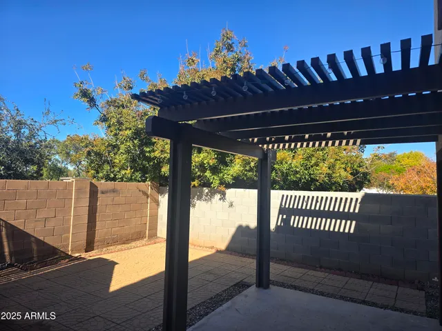 a view of a porch with a yard