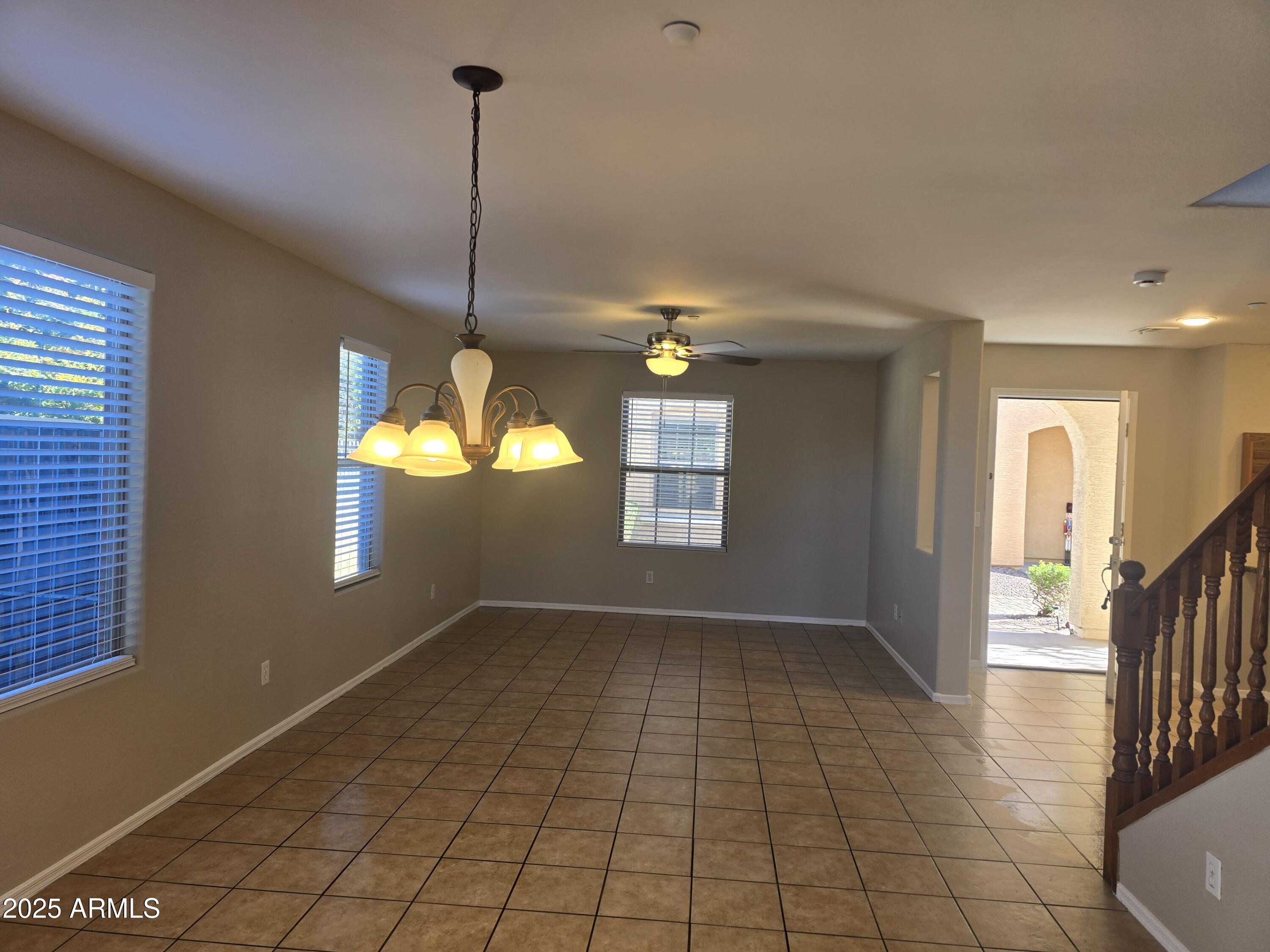 2644 East Megan Street Gilbert, AZ 85295 - Photo 4 of 21 a view of an empty room and window
