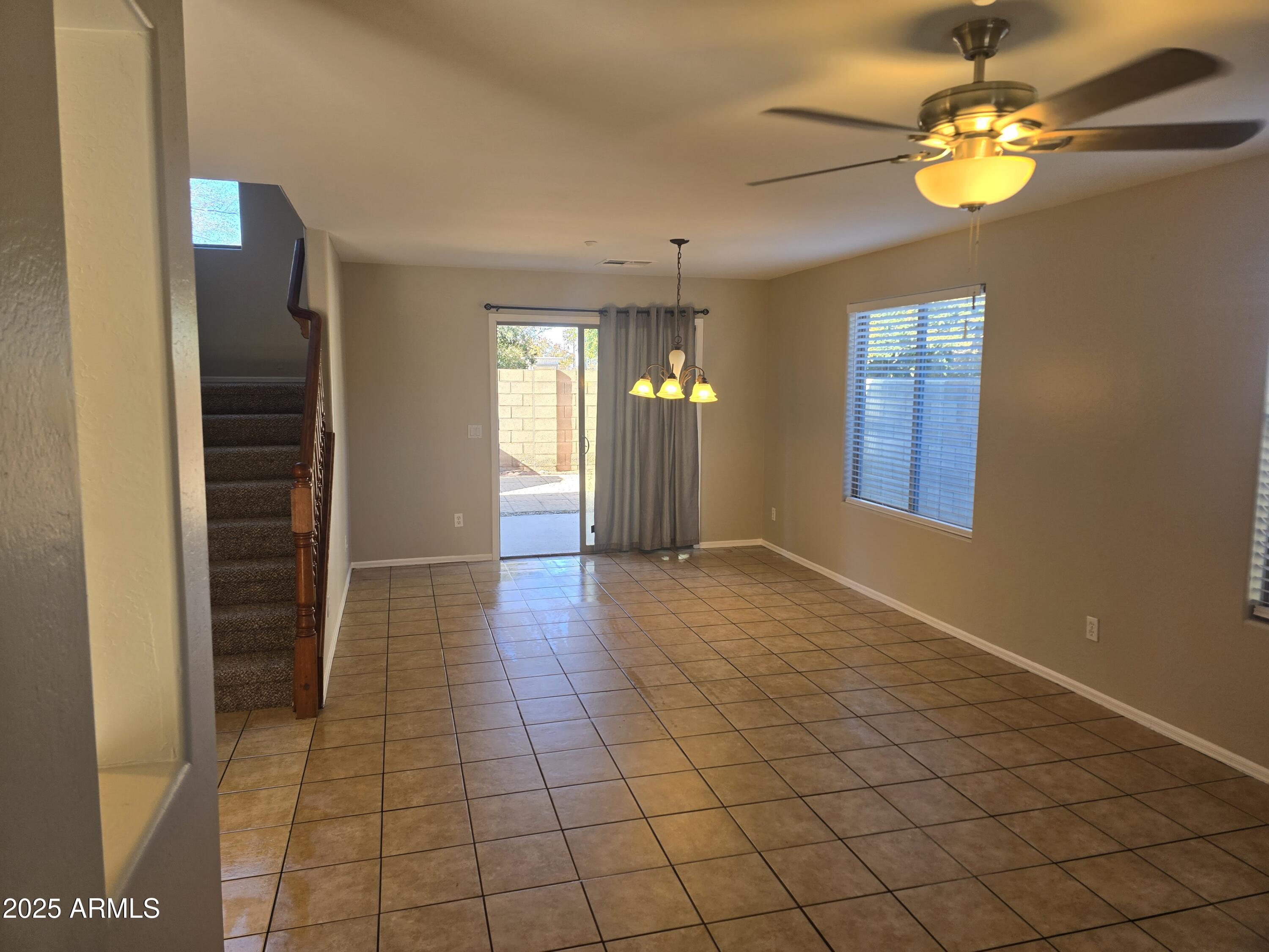 2644 East Megan Street Gilbert, AZ 85295 - Photo 5 of 21 a view of an empty room with a window