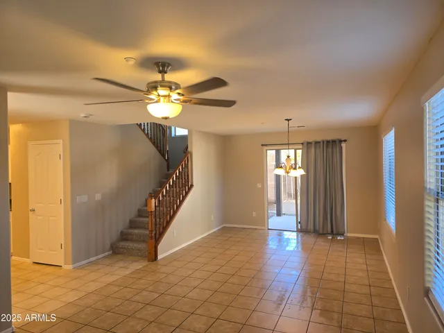 a view of an entryway with a chandelier