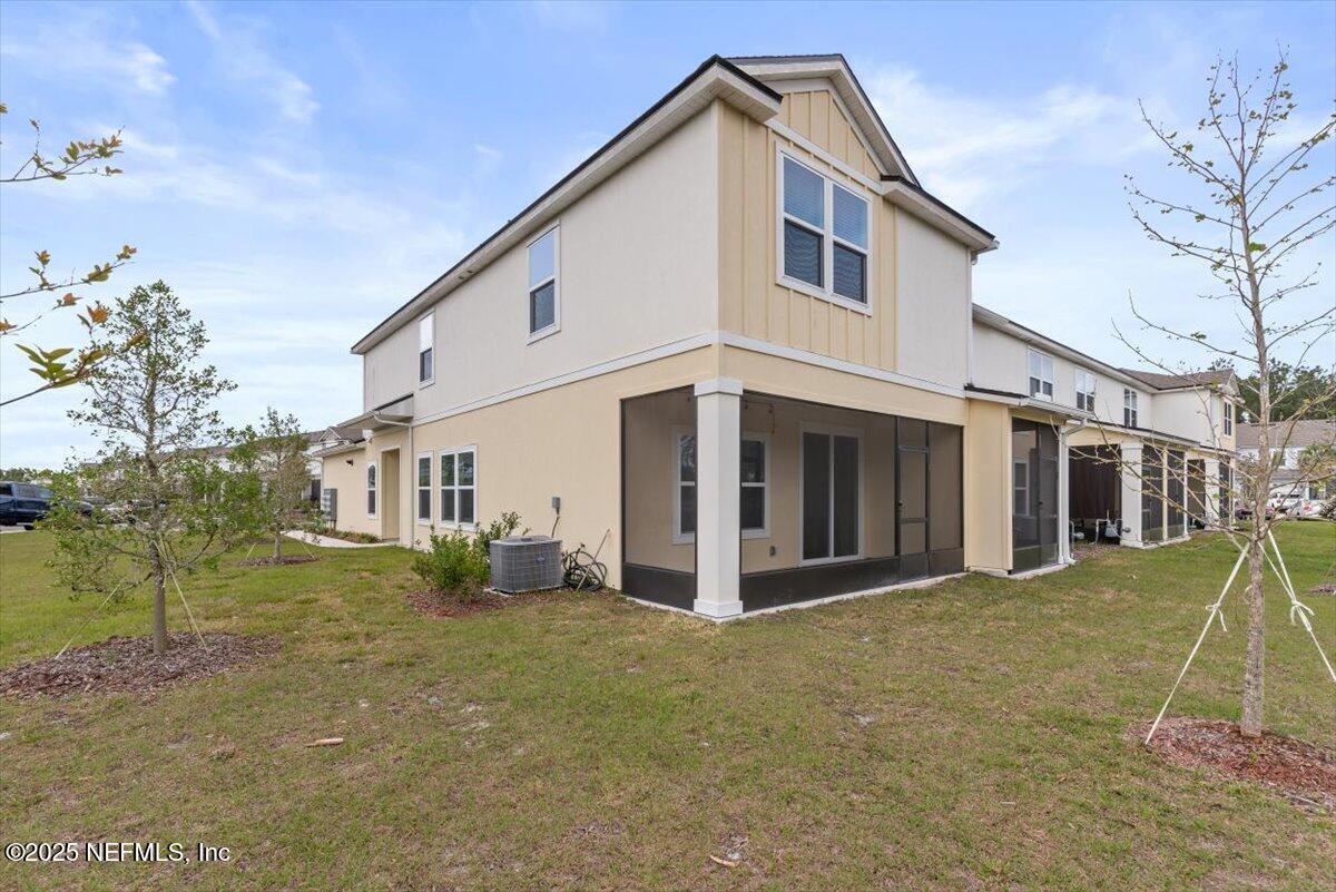 164 Java Lane St. Augustine, FL 32092 - Photo 37 of 57 a view of a house with a yard