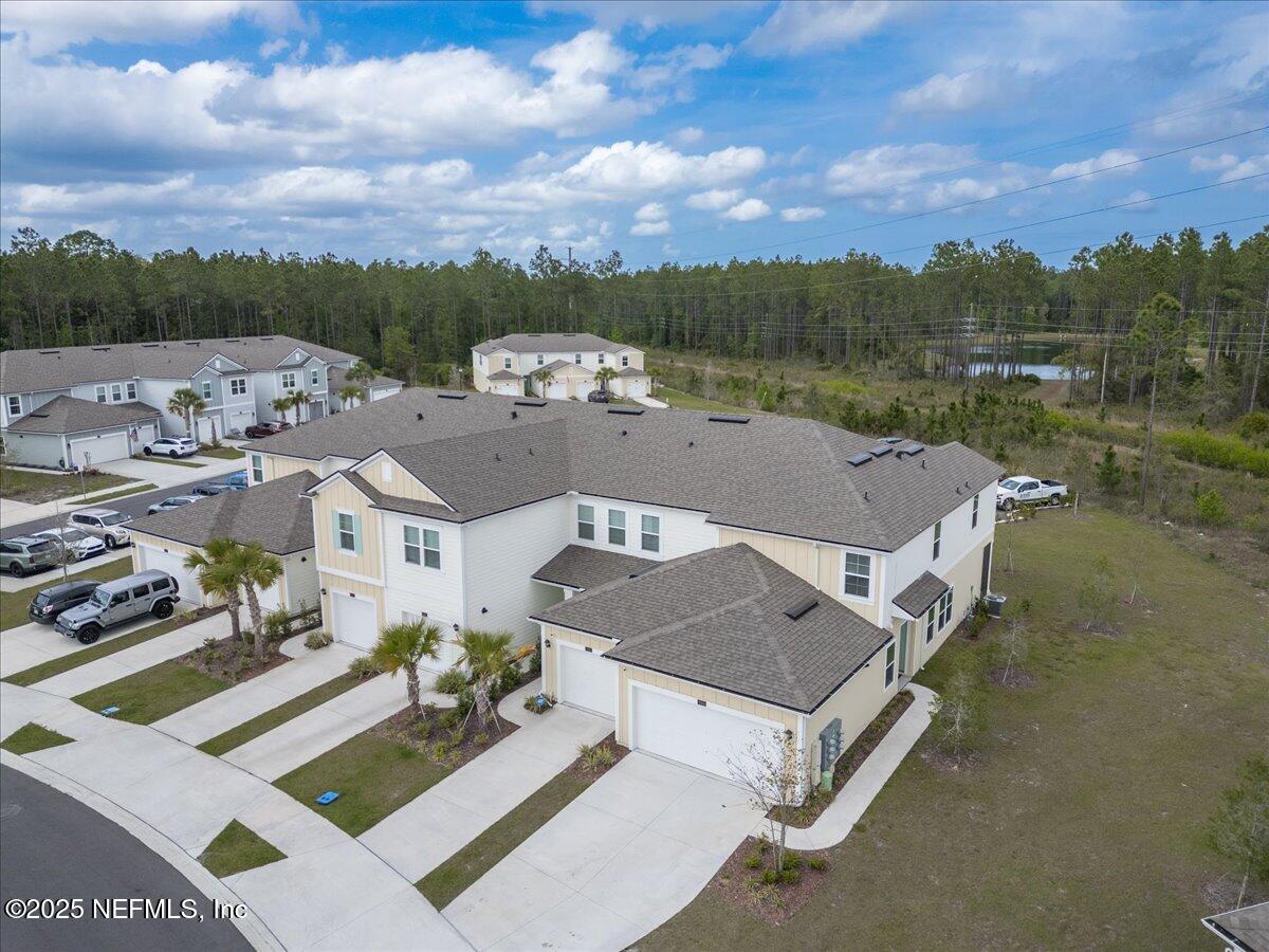 164 Java Lane St. Augustine, FL 32092 - Photo 38 of 57 an aerial view of a house with a garden