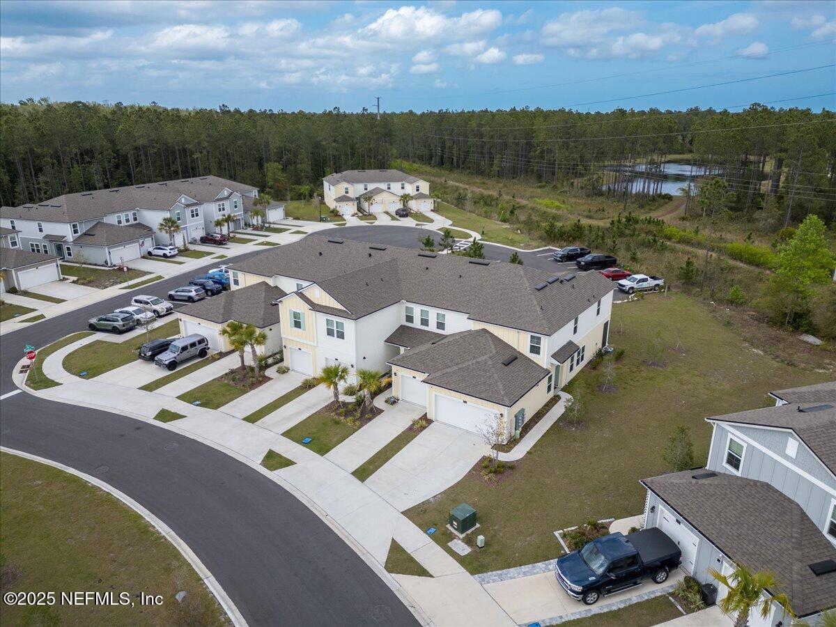 164 Java Lane St. Augustine, FL 32092 - Photo 39 of 57 an aerial view of a house with a lake view