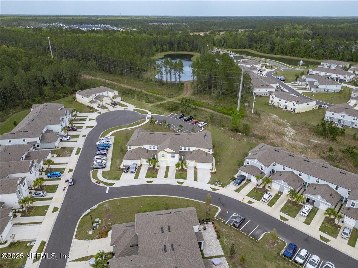 164 Java Lane St. Augustine, FL 32092 - Photo 41 of 57 an aerial view of a house with a lake view