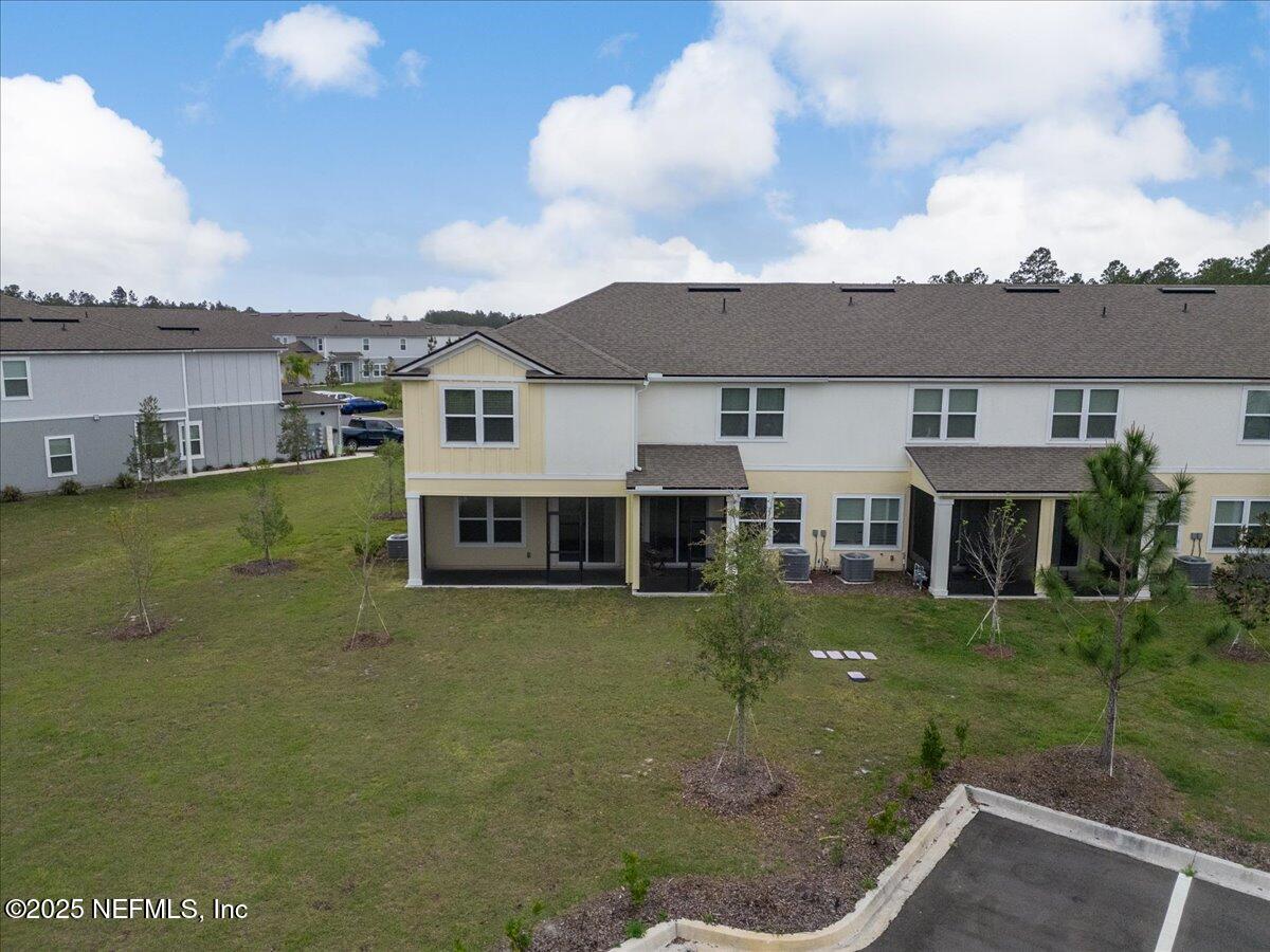 164 Java Lane St. Augustine, FL 32092 - Photo 44 of 57 a view of a house with a garden