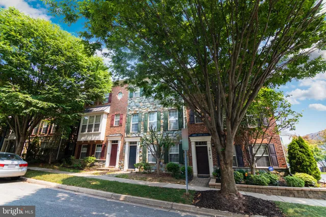 a view of a street in front of a house