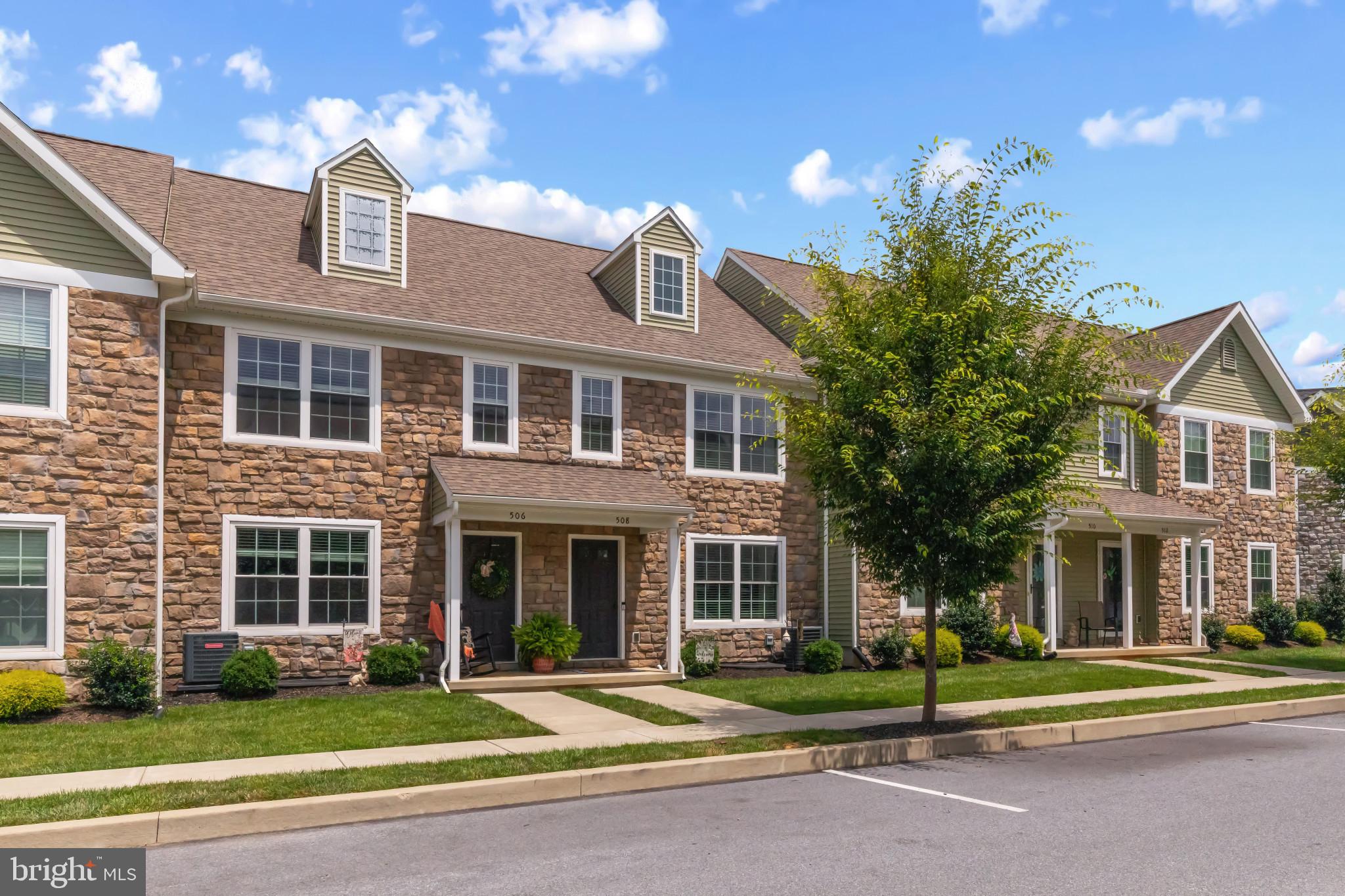 508 Byler Circle Lebanon, PA 17042 - Photo 1 of 33 a front view of a residential apartment building with a yard