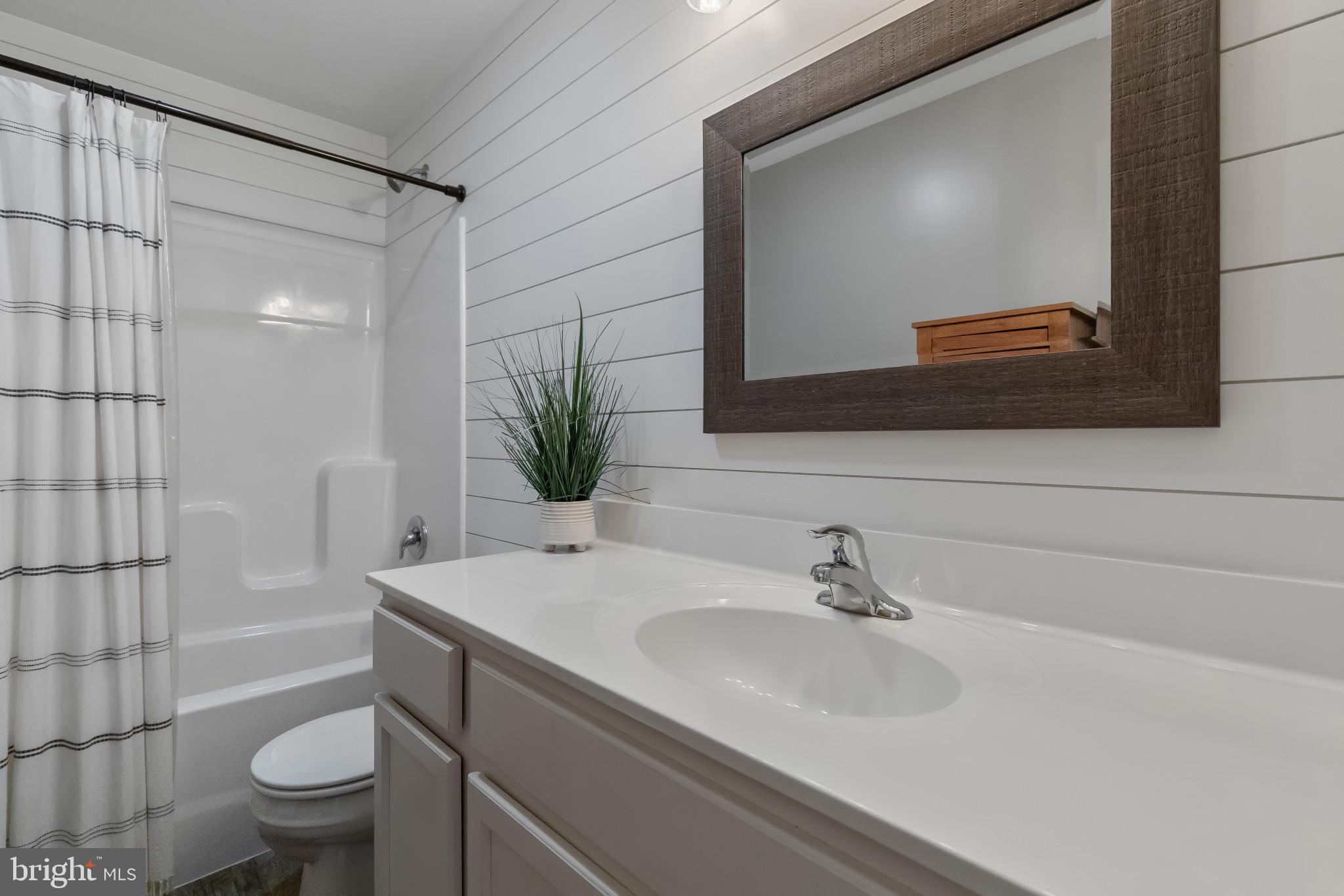 508 Byler Circle Lebanon, PA 17042 - Photo 20 of 33 a bathroom with a sink a toilet and a mirror