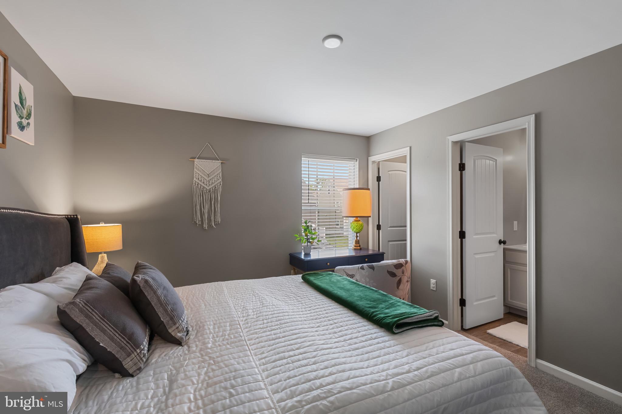 508 Byler Circle Lebanon, PA 17042 - Photo 21 of 33 a bedroom with a bed and a lamp