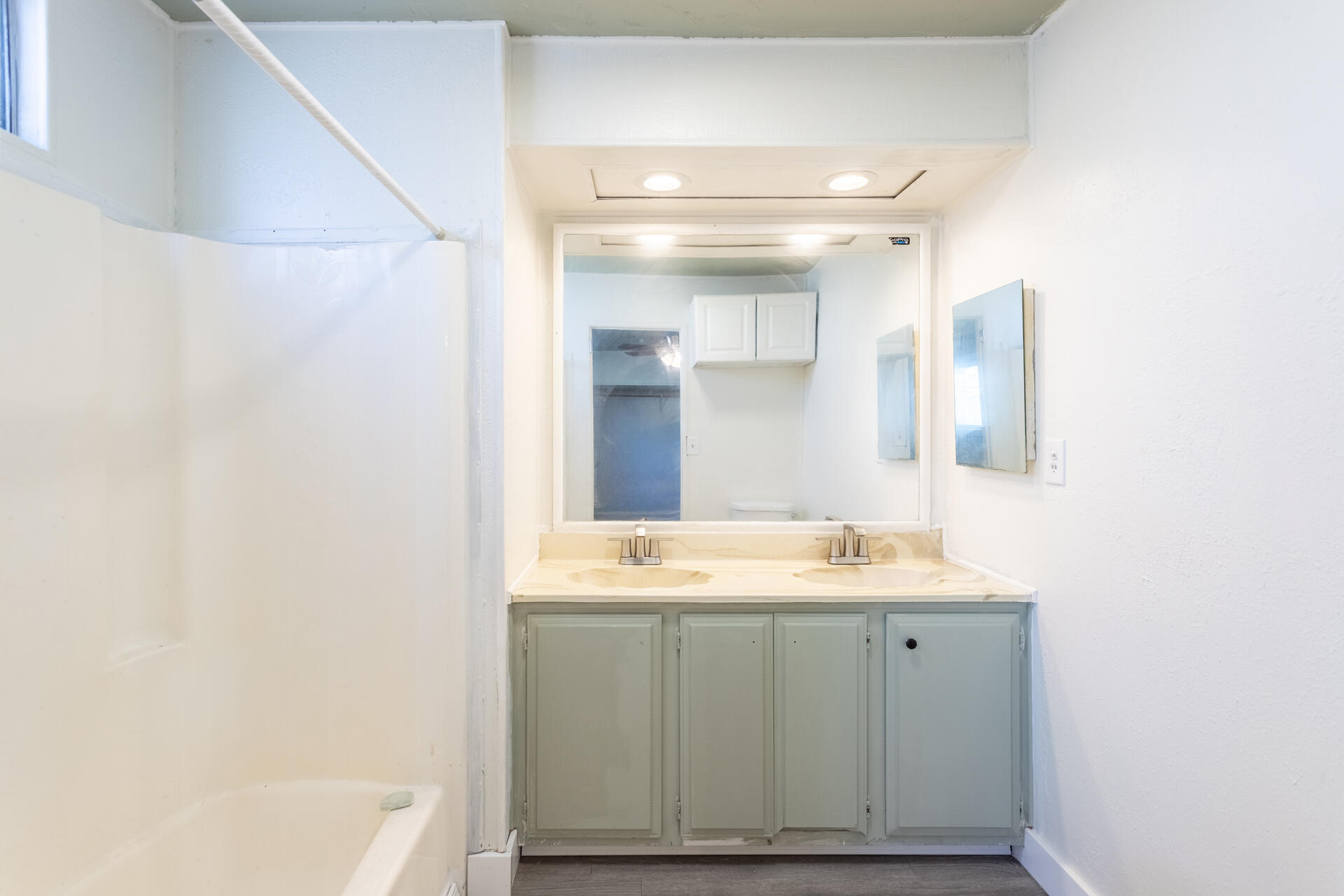 11037 Erickson Way, Unit 76 Redding, CA 96003 - Photo 8 of 13 a bathroom with a sink and a mirror
