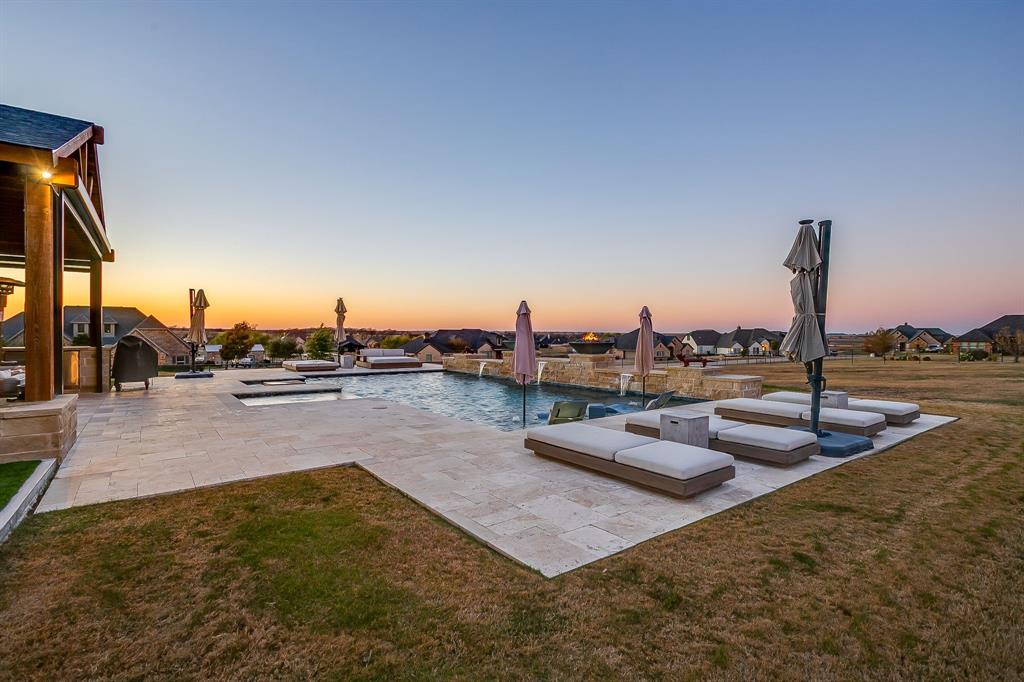 7320 Spring Ranch Court Godley, TX 76044 - Photo 11 of 40 a swimming pool with outdoor seating