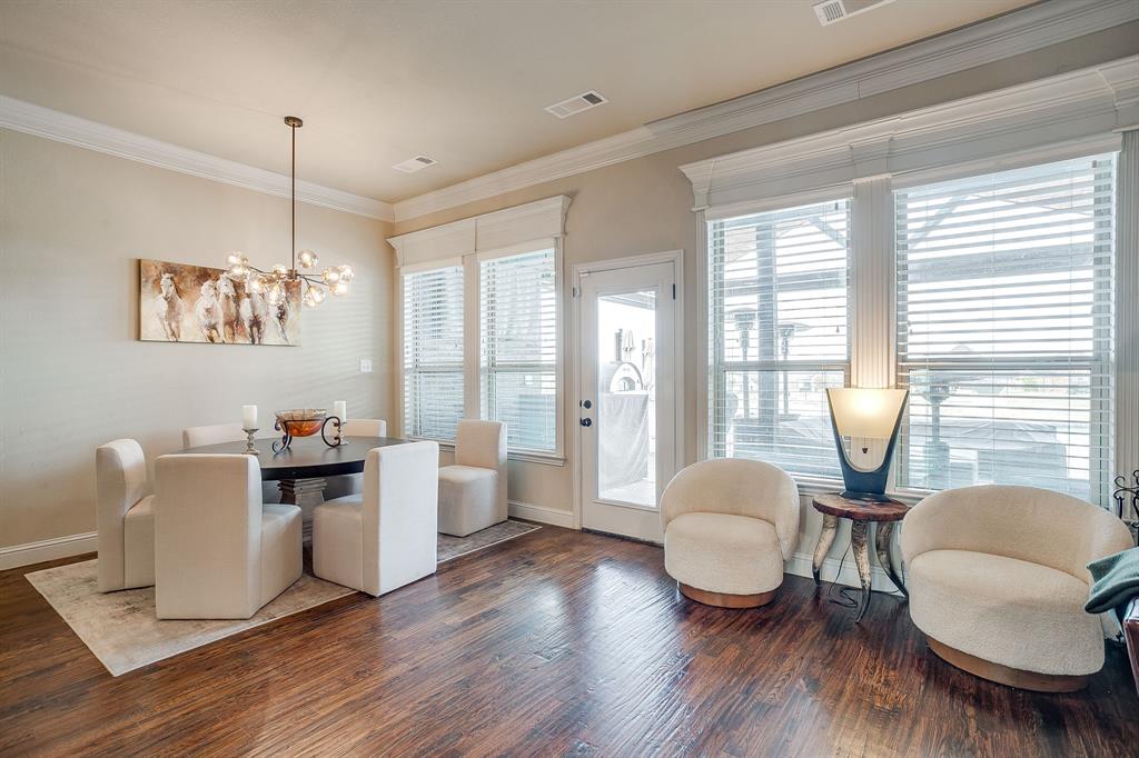7320 Spring Ranch Court Godley, TX 76044 - Photo 24 of 40 a living room with furniture and a wooden floor