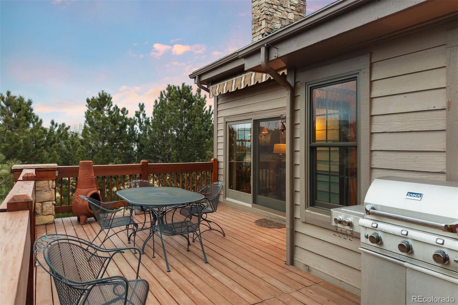 10 Roder Gate Lane Castle Pines, CO 80108 - Photo 26 of 32 a view of a chairs and table in the balcony