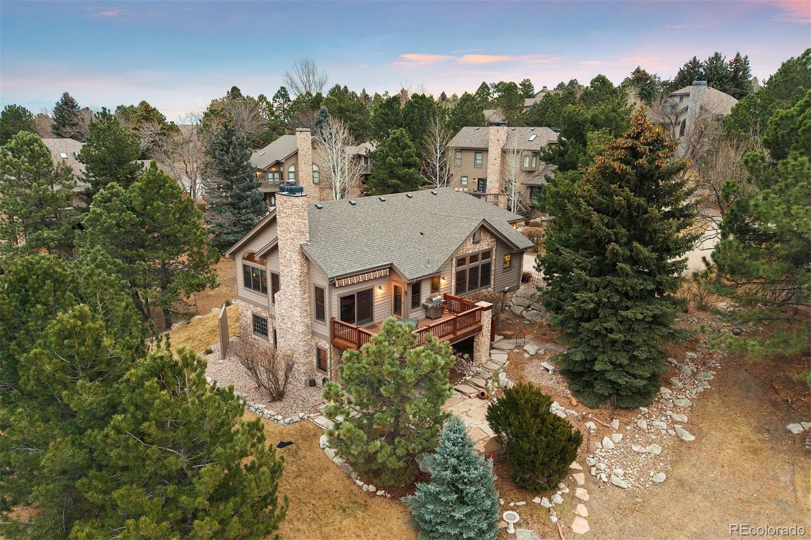 10 Roder Gate Lane Castle Pines, CO 80108 - Photo 28 of 32 an aerial view of a house with a yard