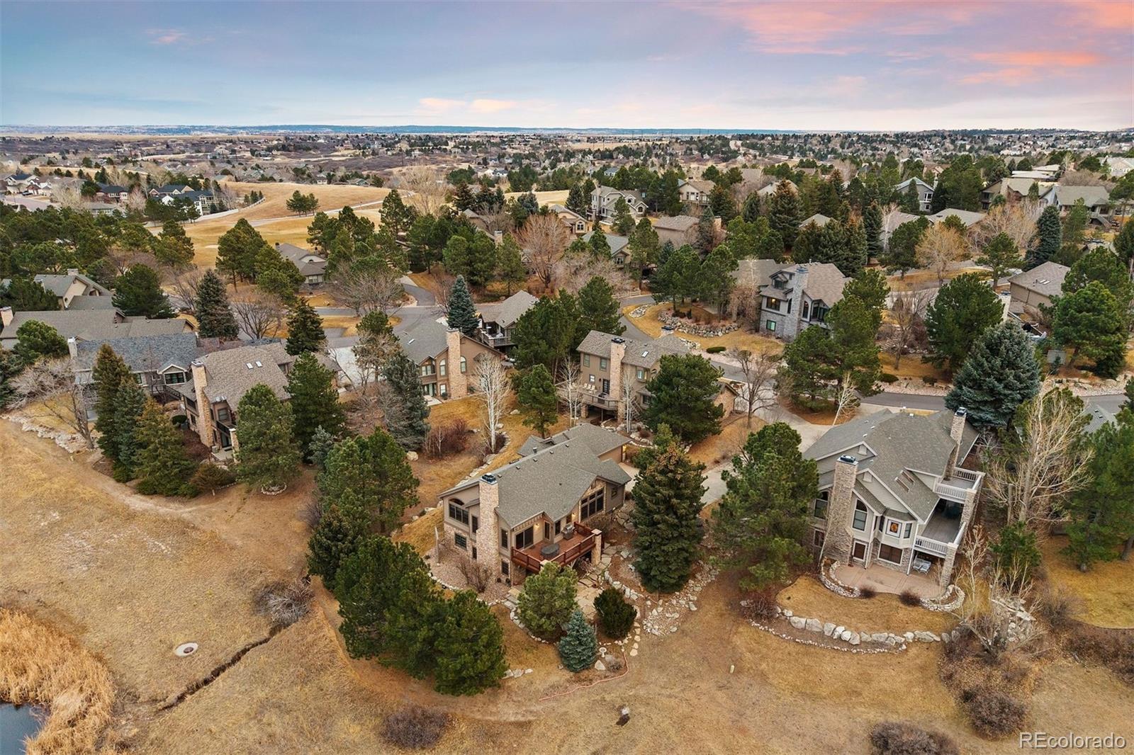 10 Roder Gate Lane Castle Pines, CO 80108 - Photo 29 of 32 an aerial view of a house with a yard