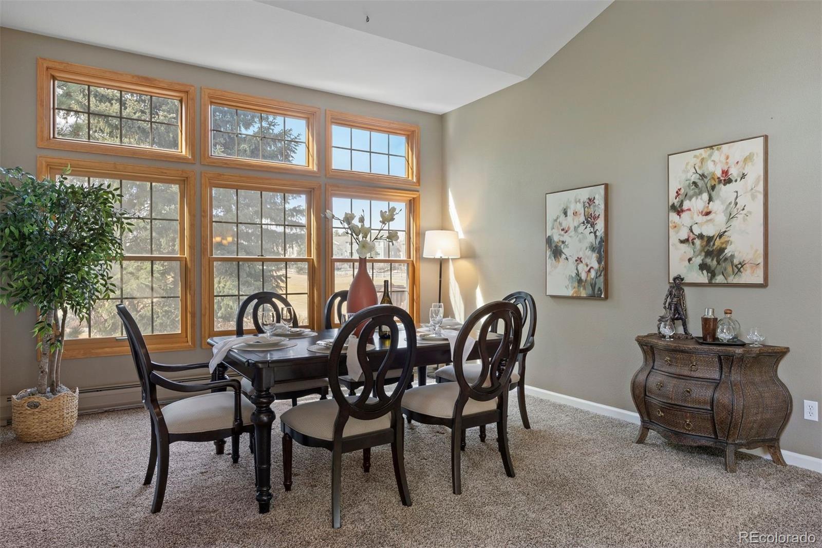 10 Roder Gate Lane Castle Pines, CO 80108 - Photo 10 of 32 a dining room with furniture and window