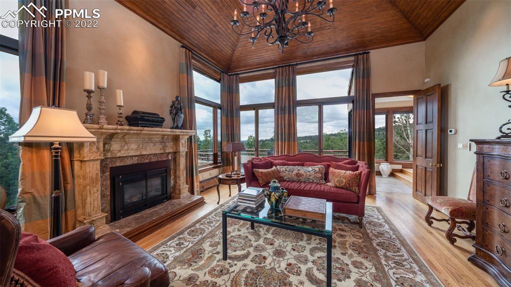 105 Marland Road Colorado Springs, CO 80906 - Photo 12 of 50 a living room with furniture and a fireplace