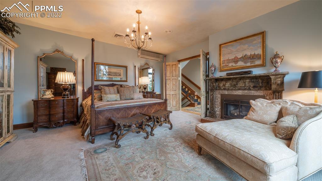 105 Marland Road Colorado Springs, CO 80906 - Photo 15 of 50 a living room with furniture and a fireplace
