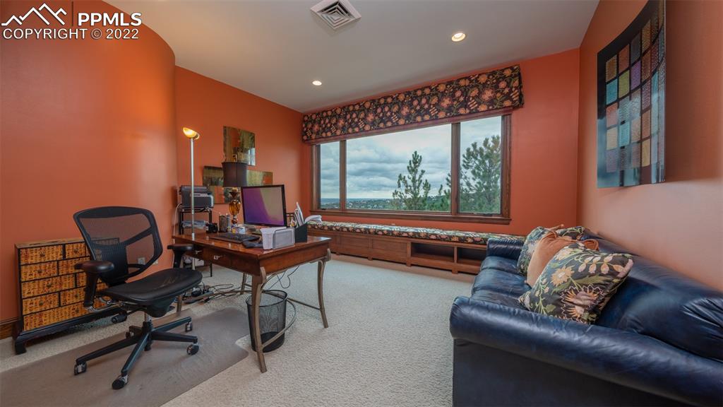 105 Marland Road Colorado Springs, CO 80906 - Photo 20 of 50 a living room with furniture and a large window