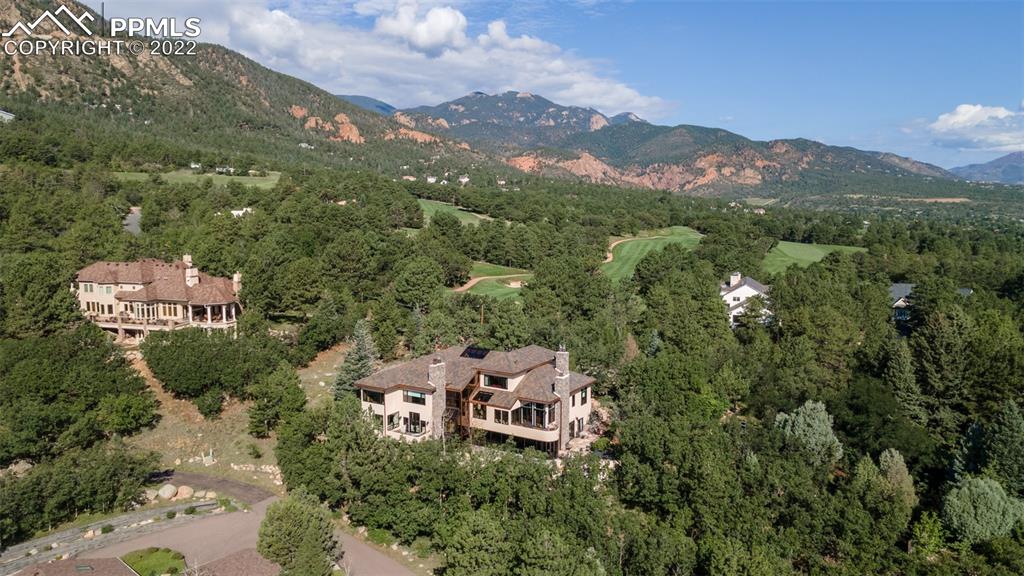 105 Marland Road Colorado Springs, CO 80906 - Photo 3 of 50 an aerial view of a house with yard and outdoor seating