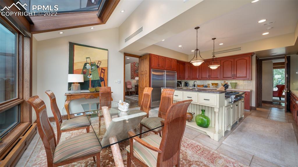 105 Marland Road Colorado Springs, CO 80906 - Photo 10 of 50 a view of a dining room with furniture