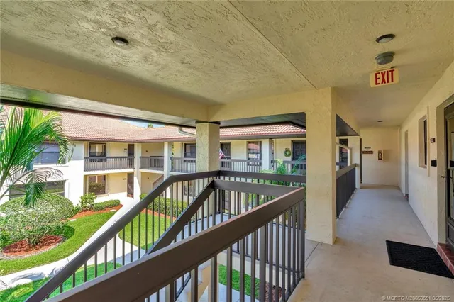 a kitchen with kitchen island granite countertop lots of counter top space and appliances