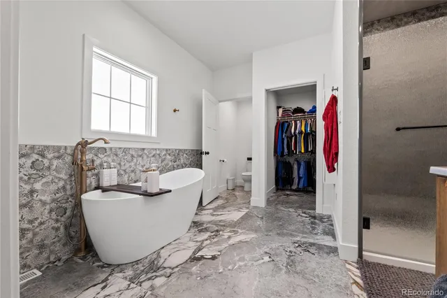 a living room with a couch and a window