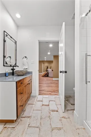 a view of bathroom with dual sinks