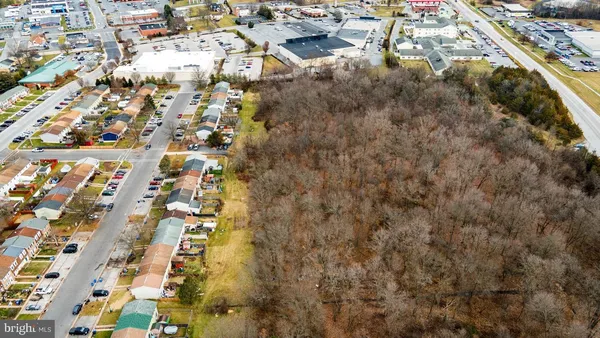 a view of residential houses with outdoor space